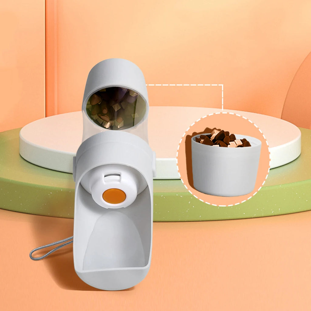 $14.99 -Portable Pet Water Bottle with Integrated Food Storage – Dual-Function Travel Feeder for Dogs and Cats