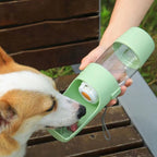$14.99 -Portable Pet Water Bottle with Integrated Food Storage – Dual-Function Travel Feeder for Dogs and Cats